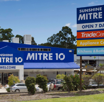 Sunshine Mitre 10 store exterior with large sign and parking lot.